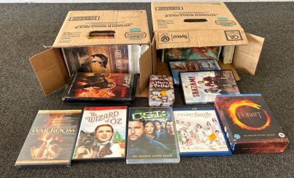 Assorted DVDs & VHS Tapes