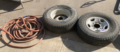 2 Tires And Water Hose