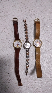 (1) (Dark Brown) Leather Belt Gold Plated Mickey Mouse Wrist Watch, (1) Metal Mickey Shaped Brace Silver Plated Wrist Watch & (1) (Tan) Leather Belt Gold Plated Winnie the Pooh Wrist Watch