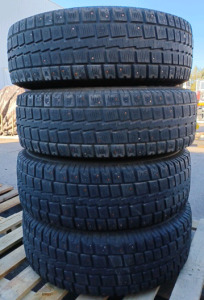 (4) Cooper Discoverer LT245/75R16 - Studed Snow Tires