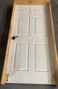 FRAMED DOOR (82”X 37”).