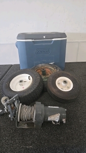 (1) Coleman Cooler (3) Wheelbarrow Wheels (1) ATV Winch