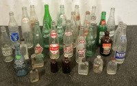 Various Antique Soda And Medicine Bottles