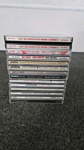 (1) Set of About 14 CDs Ranging From Bette Midler to Garth Brooks