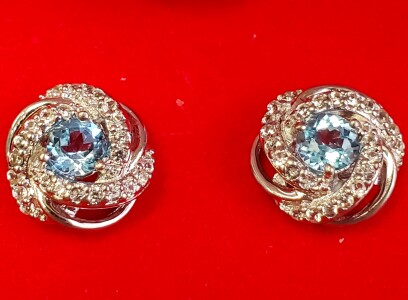 $120 Silver Blue Topaz And Cz Earrings