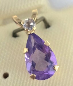 $240 10K Amethyst And Moonstone (0.7ct) Pendant