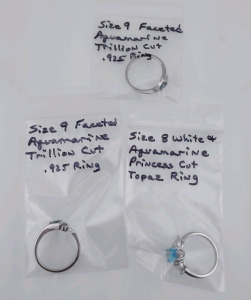 (1) Size 9 Faceted Aquamarine Trillion Cut .925 Ring, (1) Size 9 Faceted Aquamarine Trillion Cut .925 Ring, & (1) Size 8 White & Aquamarine Princess Cut Topaz Ring