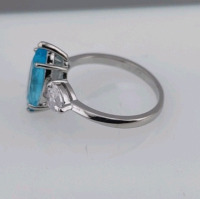 (1) Size 9 Faceted Aquamarine Trillion Cut .925 Ring, (1) Size 9 Faceted Aquamarine Trillion Cut .925 Ring, & (1) Size 8 White & Aquamarine Princess Cut Topaz Ring - 12