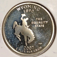(1) 1976-P Ike Bicentennial Dollar Coin, (1) 2007-S Wyoming State Quarter, (1) 1978-D Jefferson Nickel Denver Mint Nickel, (1)1985-D BroadStrike Roosevelt Dime Denver Mint, (1) 1946-S Misaligned Die Lincoln Wheat Penny, (1) 1940-P Lincoln Wheat Penny, (2) - 7