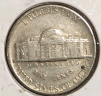 (1) 1976-P Ike Bicentennial Dollar Coin, (1) 2007-S Wyoming State Quarter, (1) 1978-D Jefferson Nickel Denver Mint Nickel, (1)1985-D BroadStrike Roosevelt Dime Denver Mint, (1) 1946-S Misaligned Die Lincoln Wheat Penny, (1) 1940-P Lincoln Wheat Penny, (2) - 9