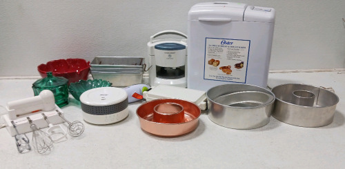Oster Bread Maker (has power), Black And Decker Lids Off, Black and Decker Handy Mixer, (6) 9x5 Pans, Decorative Bowls Cake Pans