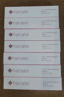 (7) 0.53-Oz Tubes Of Hanalei Lip Treatment, Rose, (1) 20-Count Box Of 50-SPF, Transparent Sunscreen Packets (1) 60-Gram Tube Of Hair Removal Smoothing Cream & (3) 8-Pack Boxes Of Aurkath Hair Claw Clips - 2