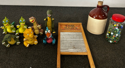 Jar Of Marbles, Dubi Handi Washing Equipment, And Dinosaurs