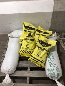 Pallet of (3) Sandbags and (4) Bags of Rock Salt