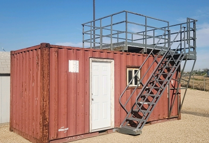 ( OFFSITE) 2004 15' x 8' 67,000 lb Capacity Storage Container With Stairs and Deck