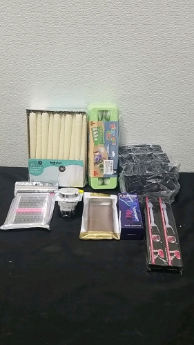 (1) Box of 30 Tapered Candles (1) Box of 24 Letter Silicone Moulds, (1) TDANCE Lash Extensions, (1) Febreze Plug, (1) KU-String Rope Thruster (2) Watermellon Dicers