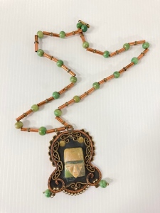 Carved Onyx Aztec Face Necklace On Copper