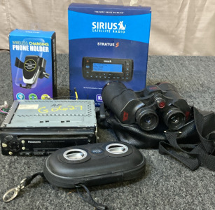 WIRELESS CHARGING PHONE HOLDER. SIRIUS XM STRATUS 5, PANASONIC DP22 CAR STEREO, SIMMONS RED LINE BINOCULARS. AND MORE.