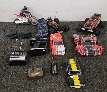 Helion R/C Cars (2) Cars (5) Bodies (1) Motor Cycle 1 Remote For The Cars 1 Remote For The Motor Cycle