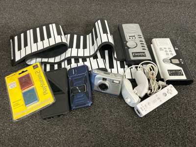 (2) Flexible Pianos, Cell Phone, Dogitak Camera, Wii Remotes and Memory Cards