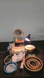 (10) Embroidery Rings in Different Sizes (2) Patterns (1) Roll of Cross Stitch Fabric (1) Grandma Style Sewing Kit and So Much More!