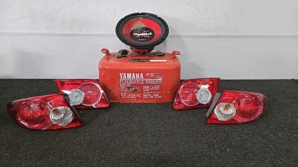 (1) Xplod Sony Woofer (1) Set of Headlight Replacements (1) Set of Taillight Replacements (1) Yamaha 6.3 Gallon Gas Can