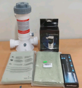 (1) Automatic Chlorinator (1) Alcotrace Breathalyzer (1) Amtilope Flashlight & Much More (cow)