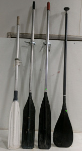 (1) Assorted Boat Paddle Collection &ndash; (1) White Plastic Paddle, (2) Black Aluminum Paddles, (1) Black Canoe Paddle
