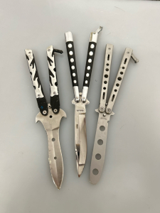 (2) Butterfly Knives and (1) Practice Knife