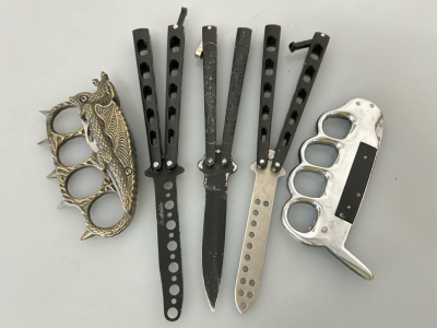 (2) Practice Butterfly Knives, (1) Butterfly Knife, and (2) Paperweights