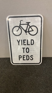 Yield To Peds Sign