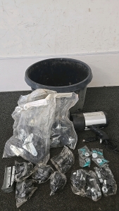 (1) Set of 12 Different Baggies of Hardware (1) Vector Lite 1.5 Million Candle Power Flashlight (3) Bags of Cart Wheels with Instructions and a Tool To Attach Them (1) Large Black Plastic Planter