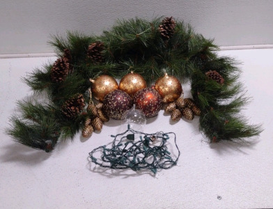 (1) Pine Wreath w/ Pine Cones Inside, (1) String of Christmas Lights, & (8) Assorted Christmas Ornaments