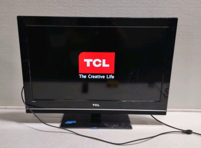 (1) 31"x 20½"x 3½" TCL Flat Screen TV