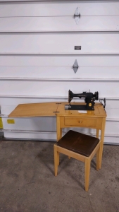 23¼"x 16½"x 31" 1951 Singer Sewing Machine Table w/ Sewing Machine Oil & Some Parts & (1) 17"x 15"x 19" Brown Leather Top Wooden Stool