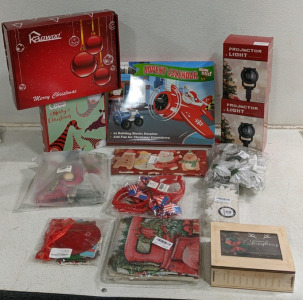 (1) Christmas Decor Lot - (2) Christmas Projector Lights (1) Advent Calendar (1) Set of Christmas Ornaments and More!