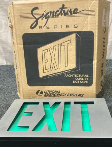 (2) LITHONIA EMERGENCY SYSTEMS SIGNATURE SERIES EXIT SIGNS.