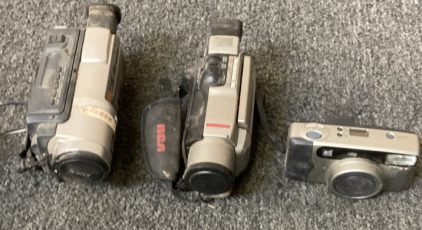 VINTAGE SONY CAMCORDER (UNTESTED NEEDS CHARGED), VINTAGE RCA CAMCORDER WITH REMOTE (UNTESTED NEEDS CHARGED), VINTAGE NIKON CAMERA.