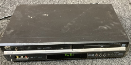 JVC VHS/ DVD PLAYER COMBO. (TESTED DOES TURN ON).