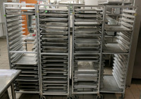 (4) Rolling Baking Racks (62) Baking Sheets