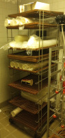 An Assortment of Coca-Cola Cups and Lids (1) Four Tier Wire Rack (4) Deep Fryer Baskets & Much More - 2