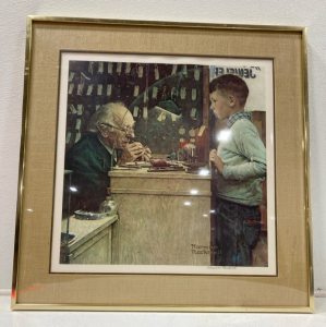 (1) Norman Rockwell “Watchmaker Of Switzerland” Painting Metal Frame