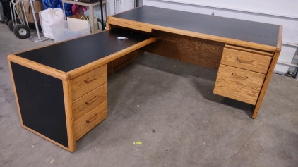 (1) 6'x 6'11"x 2'6" 2-Piece Sectional Desk (Light Wood/ Black Leather Like Top)