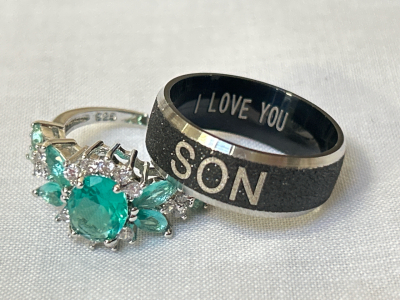 Beautiful Woman's Ring with Teal Stones Size (6) and Men’s Size 10 Black Ring