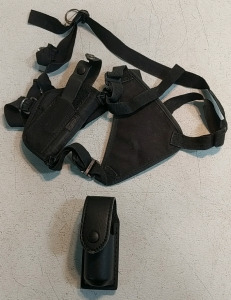 (2) Holsters – (1) Uncle Mike's Sidekick Shoulder Holster (1) Safariland Pepper Spray Belt Holster