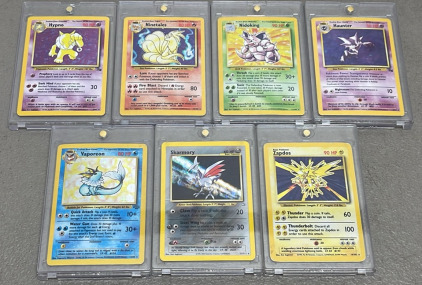 (7) Collectible Holo Pokeman Cards (Carded)