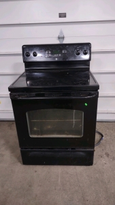 G.E. Black 4-Burner Stove w/ Oven