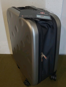 (1) Wemge Sabre Hardside Rolling Suitcase, 14"W x 20"H x 8"D.