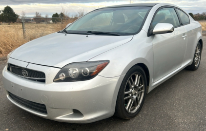 2010 TOYOTA SCION - AFTERMARKET HEADLIGHTS