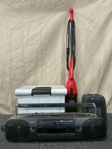 Vacuum, Boombox, Heater, And File Container